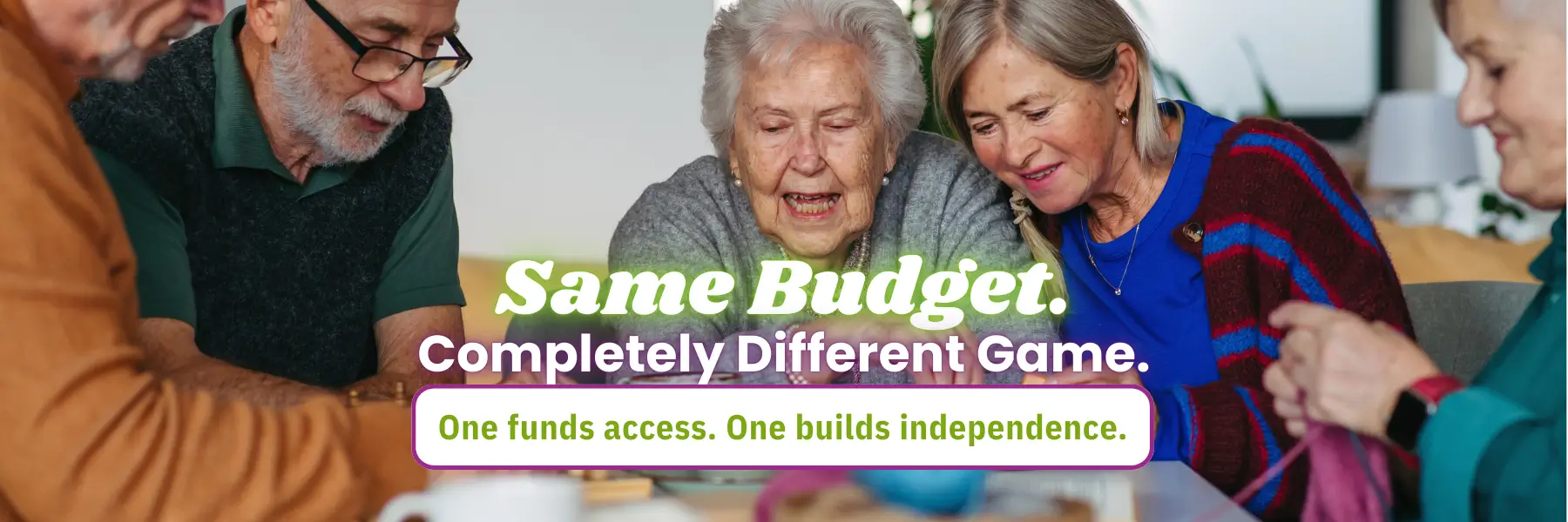 A group of people engaging in a discussion around a table, featuring knitting materials and a vibrant, colorful setting
