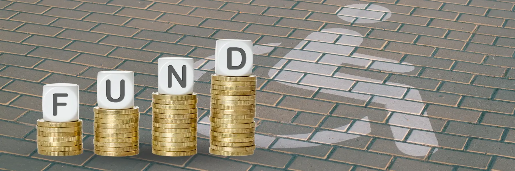 Stacks of coins spell fund on a brick road, with a pedestrian symbol in white